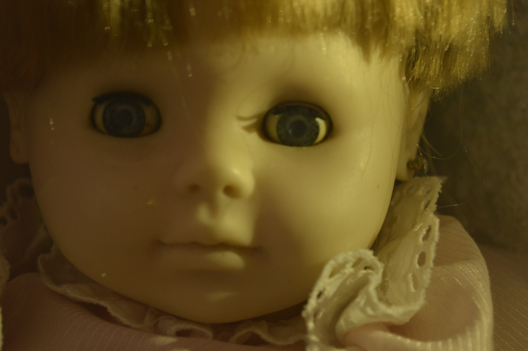creppy doll staring directly into your soul